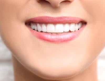 person with a complete, healthy smile