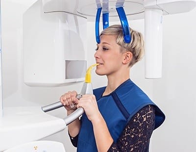 Woman receiving 3D CT scan