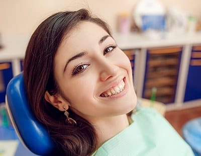 Woman smiling in dental chair