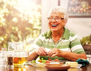 Woman smiling with dentures