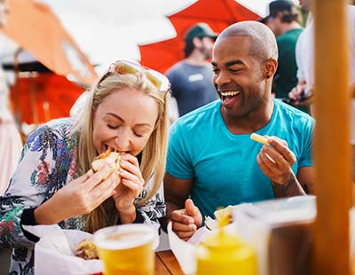 Couple eating healthy to prevent a dental emergency in Frederick