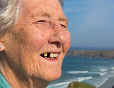 Older woman with multiple missing teeth in Frederick.