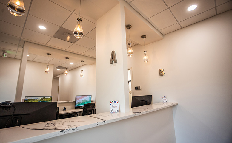 display of framed photos in waiting room