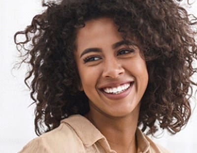 attractive young woman curly hair