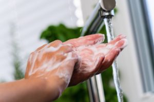 Frederick dentist washing their hands in COVID-19