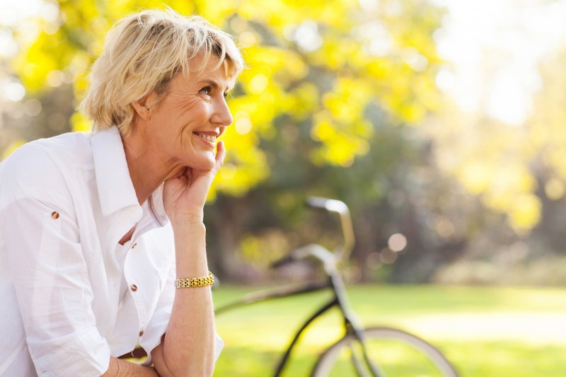 woman smiling with dental implants