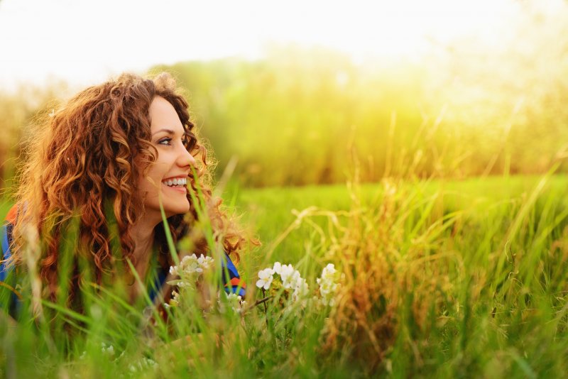 Woman smiling in a meadow