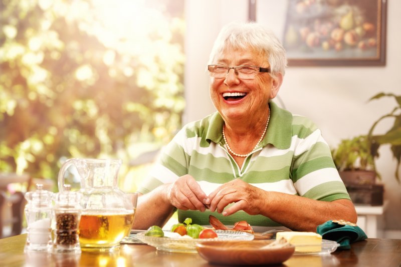 Woman smiling with dentures